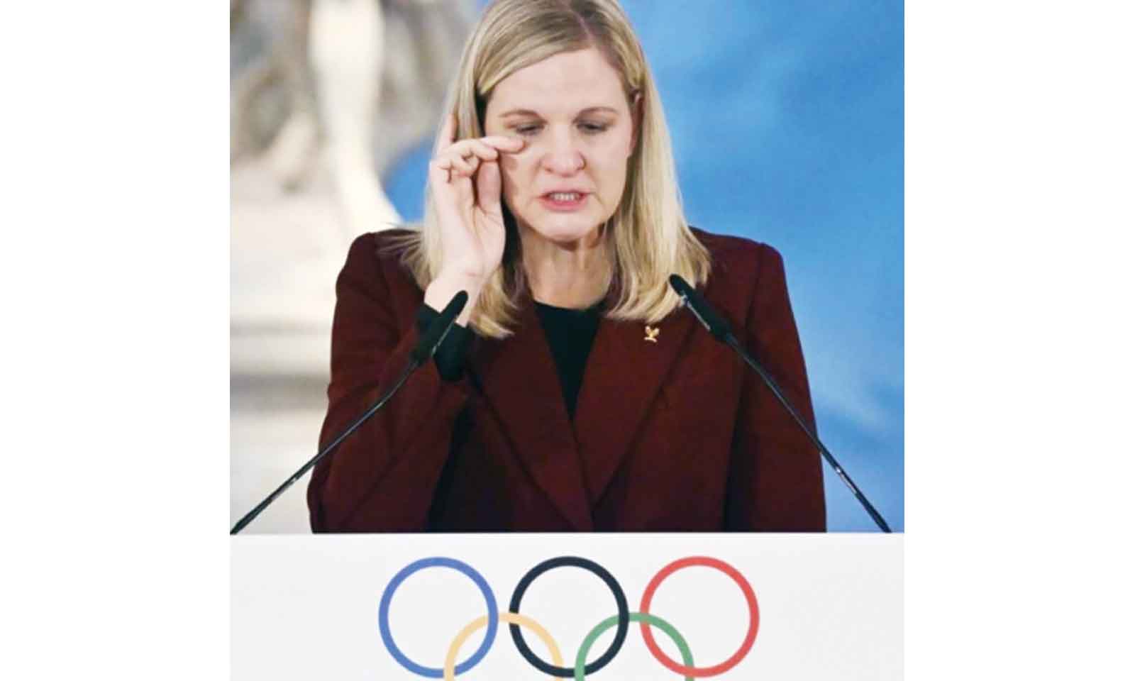 Kirsty Coventry in tears . . . Winter Games torch sets off