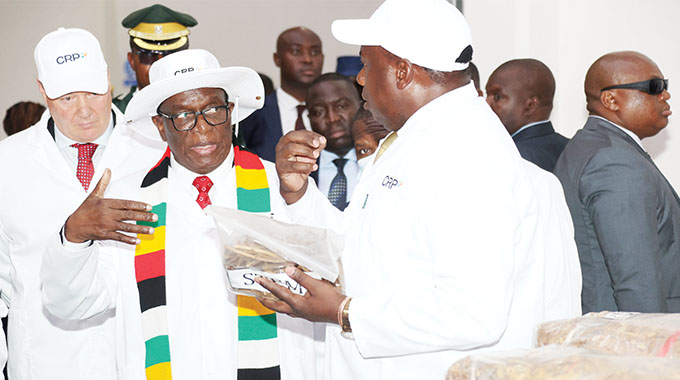President commissions US$100million tobacco plant. . . pledges to cut red tape