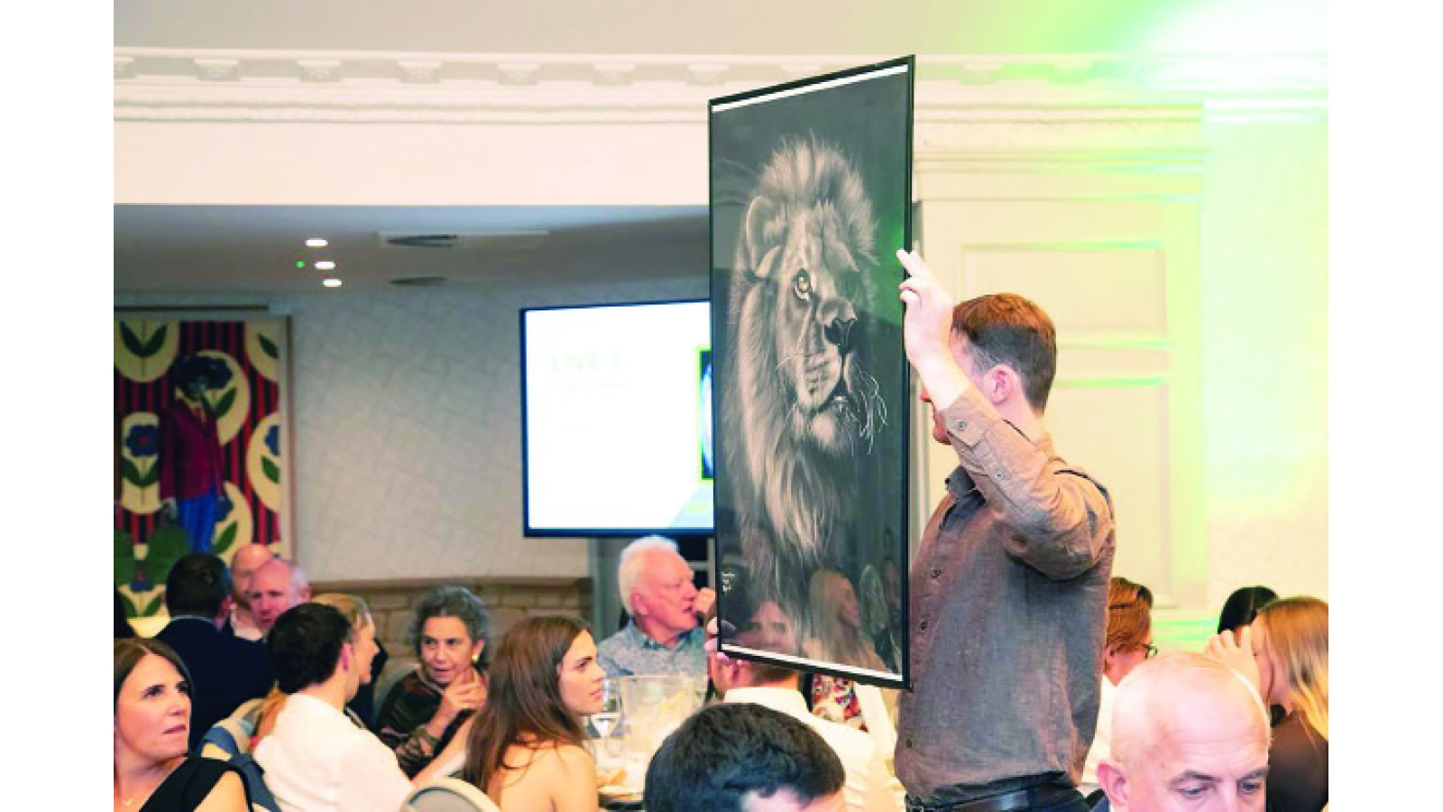 Artist raises US$9k at charity auction