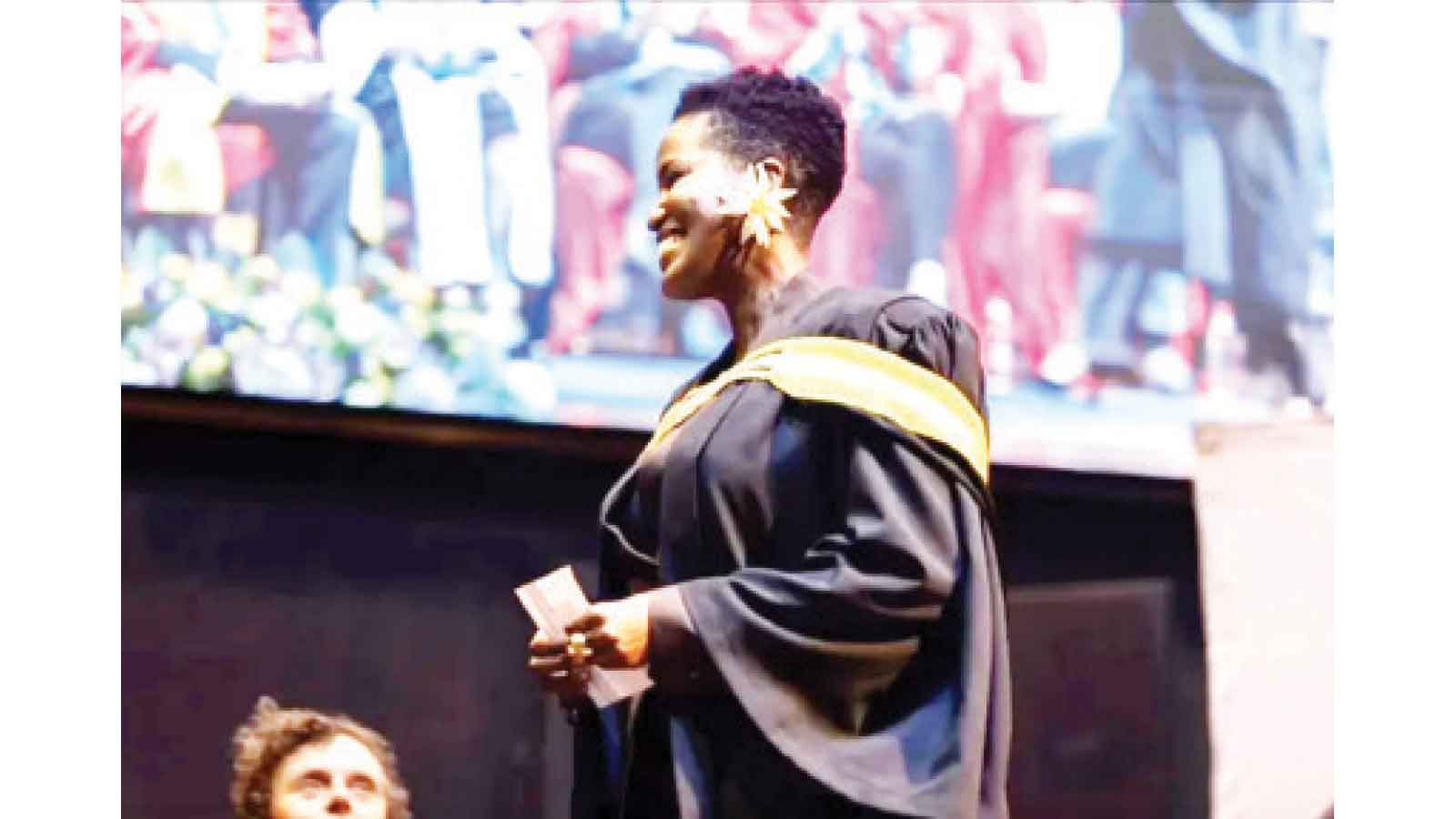 Masasa Mbangeni graduates with honours