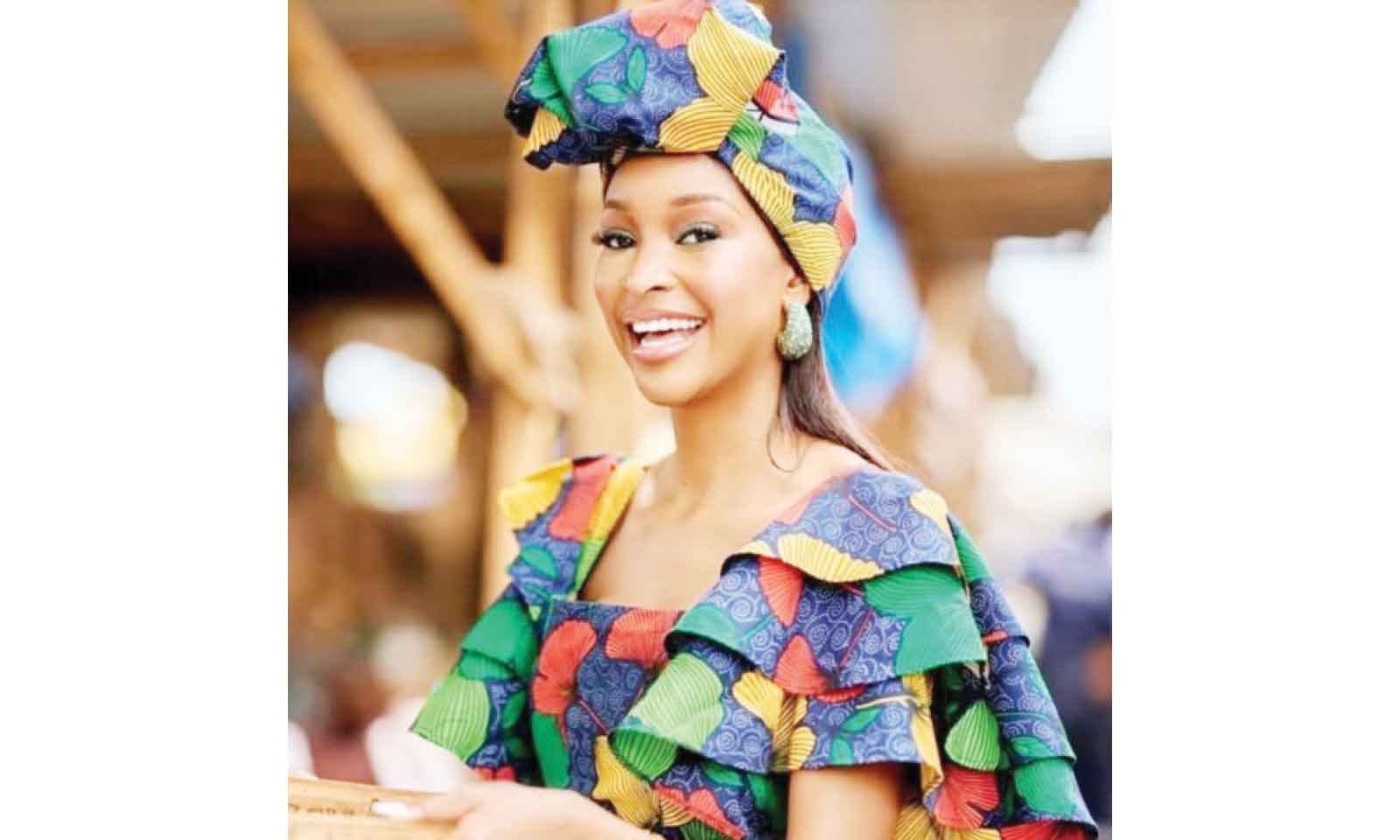 MISS COSMO APPEALS FOR SUPPORT AS SHE FLIES ZIM FLAG IN VIETNAM