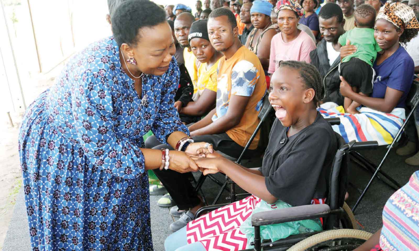 Smiles as multitudes receive abundant food hampers from First Lady in Nyabira