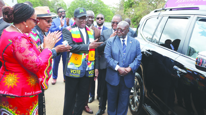 President warns against detractors. . . hands over 21 vehicles, cash to Women’s League