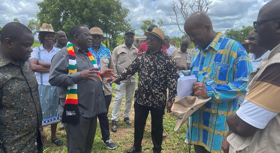 Zimbabwe’s Ambassador to Mozambique, Ambassador Victor Matemadanda (second from left) stresses a point to Home Affairs and Cultural Heritage Minister Honourable Kazembe Kazembe (centre) during a recent tour of Chimoio Shrines