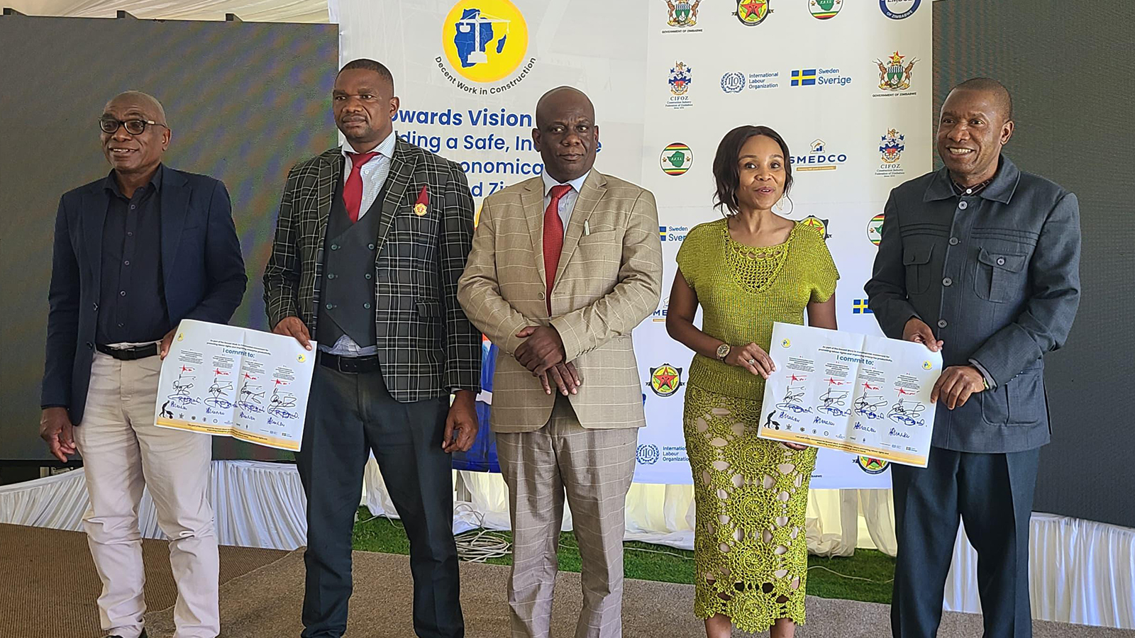 Government construction sector sign decent work pledge