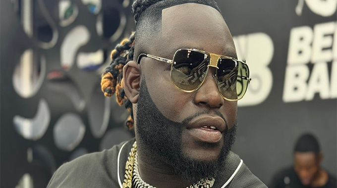 SHINSOMAN ARRESTED IN GANJA SMOKE: Dancehall chanter caught puffing away with pals