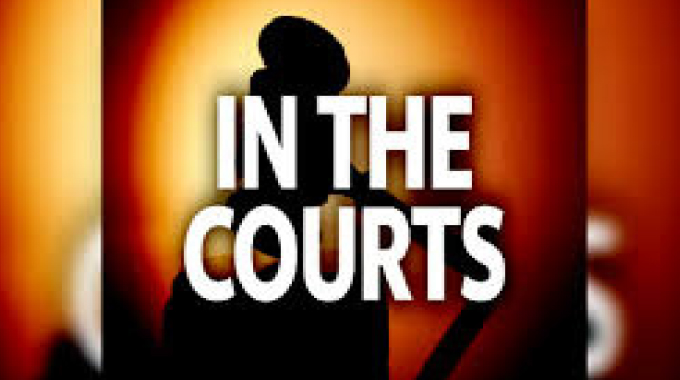 Suspect caged for threatening magistrate
