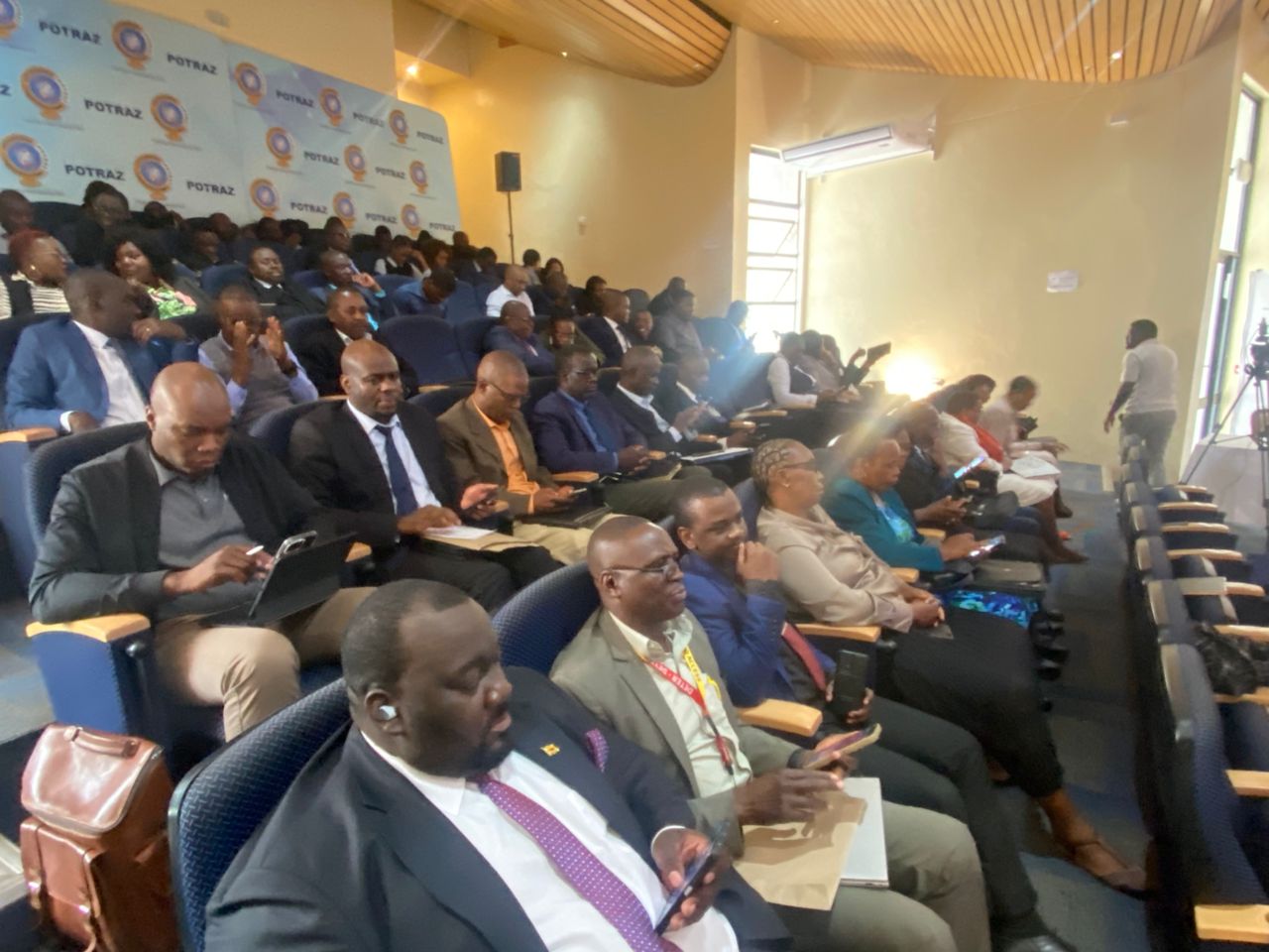 ICT stakeholders follow proceedings at an engagement meeting with the Ministry of ICT, Postal and Courier Services in Harare