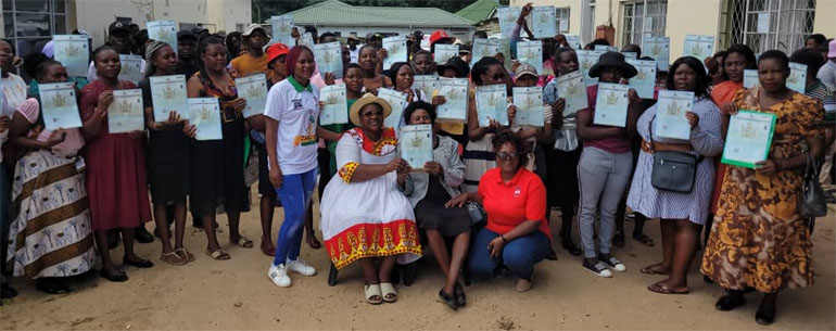 Zanu PF Women's League members, led by provincial chairlady Cde Dorothy Mabika (seated left), display their recently acquired learners' licences at the party offices in Mutare