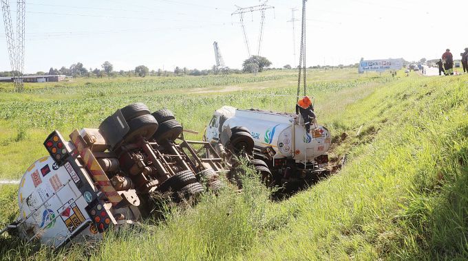 Split second from tragedy: 40 000-litre petrol tanker spills fear on the highway