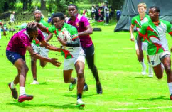 Rockstar’s Takunda Muchongwe tries to work his way past opponents while being supported by Munyaradzi Munjoma and Tasso Dobropoulos