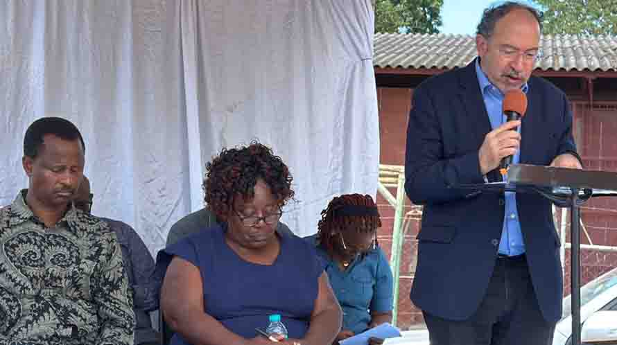 UNESCO Assistant Director-General, Dr Tawfik Jelassi, delivers an address while Information, Publicity and Broadcasting Services Deputy Minister Honourable Omupilo Marupi (left) and other officials follow proceedings