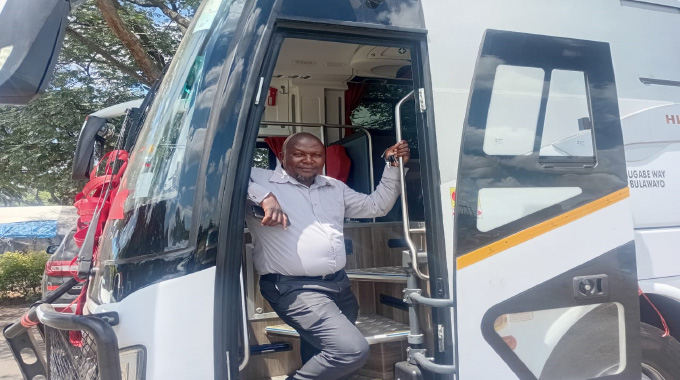 MBOMA AT THE WHEEL …Bosso century-old pride driven by bus hero