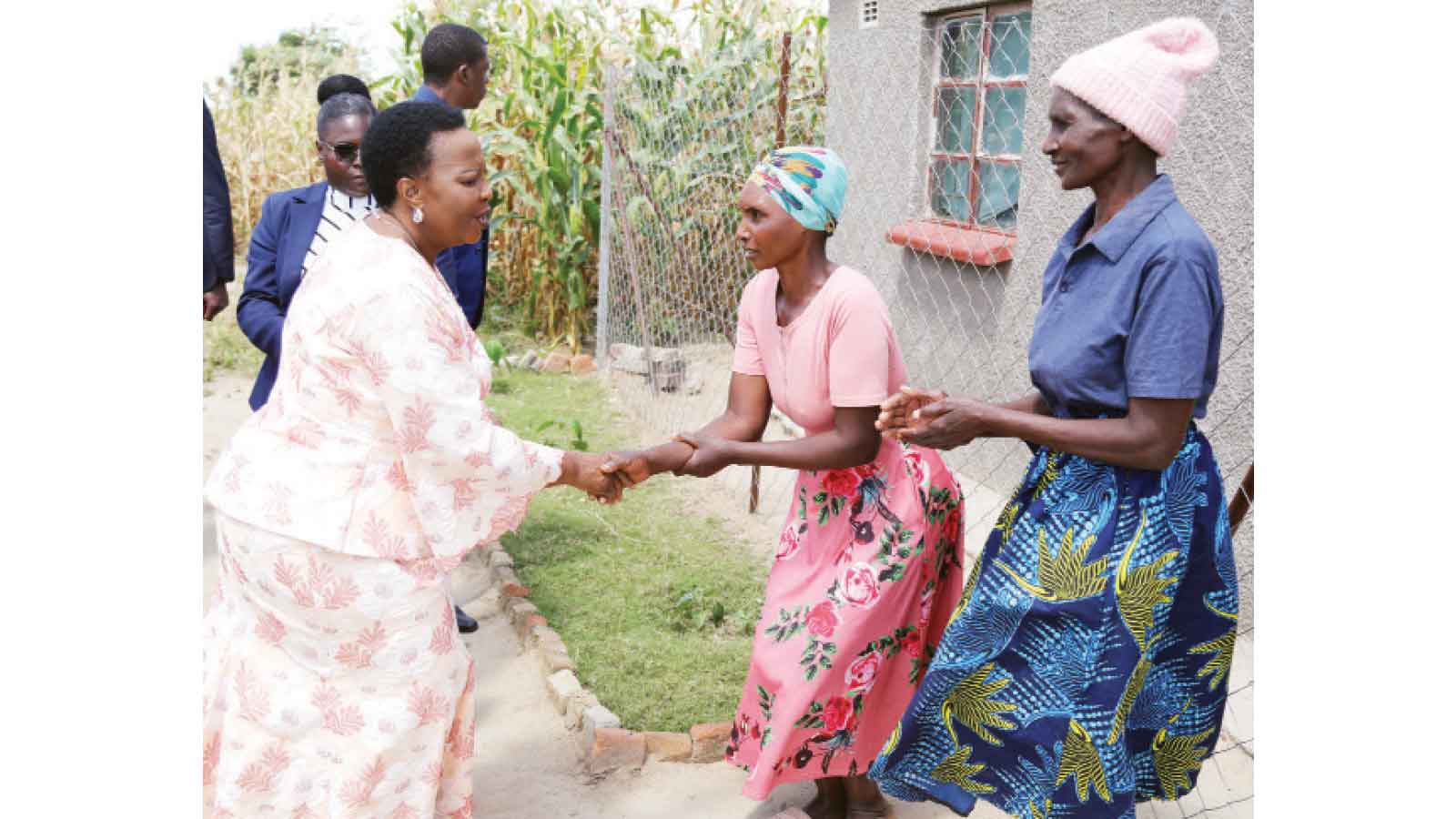 First Lady visits family of four sisters caring for nine children with cerebral palsy . . . showers them with love, donates wheelchairs, blankets, clothes, groceries