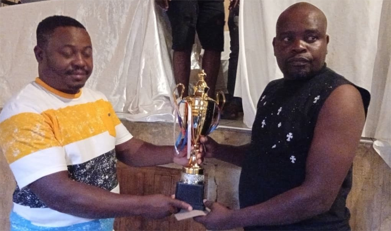 MPL chairman, Harris Shoni hands over the third place prize to Why Why Pool club owner, Shingirai Chahwanda during last season’s end of year awards ceremony