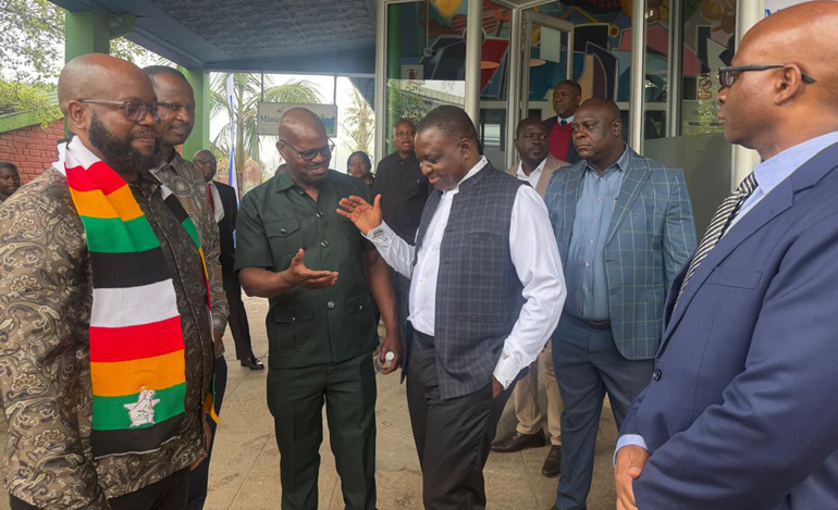 Information, Publicity and Broadcasting Services Minister, Dr Zhemu Soda chats with Permanent Secretary, Mr Nick Mangwana