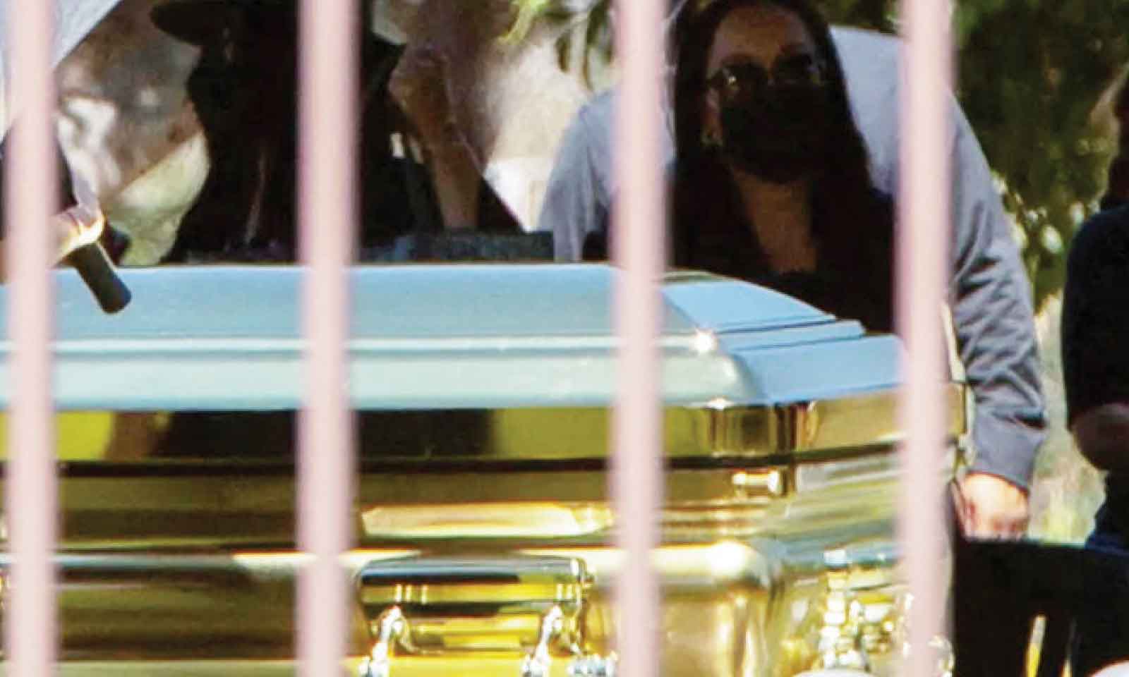 EL MENCHO BURIED IN A GOLDEN CASKET