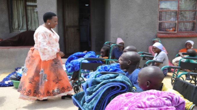 First Lady visits family of four sisters caring for nine children with cerebral palsy