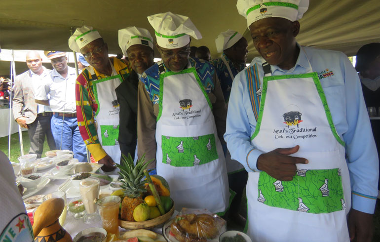 Tourism and Hospitality Industry Permanent Secretary (right), Secretary for Manicaland Provincial Affairs and Devolution, Mr Abbiot Maronge and Chief Zimunya (far left) tour stands during the Amai Traditional Cook-Out Competition early this week.-Picture: Hazel Chitepo