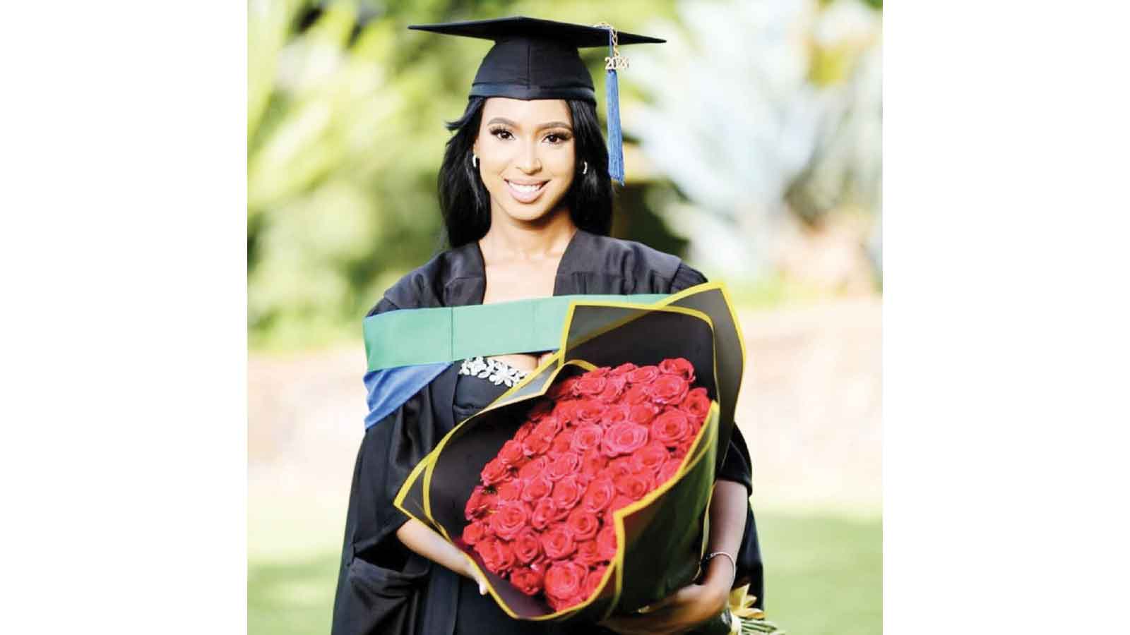 Vourné Kgosinkwe celebrates  her graduation achievement