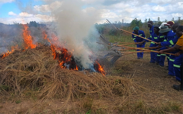 Domborutinhira villagers put out a fire in a mock drill