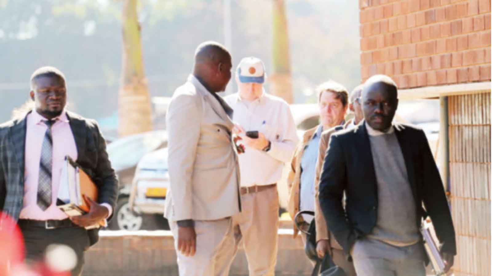 US$30m fraud lands pair in dock