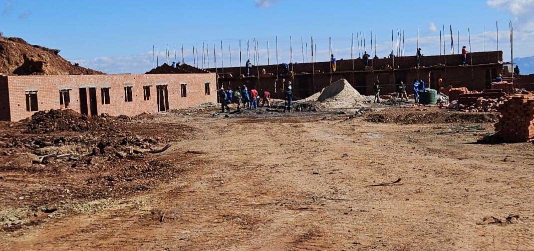 Construction of offices, staff quarters and warehouse was in full swing this week