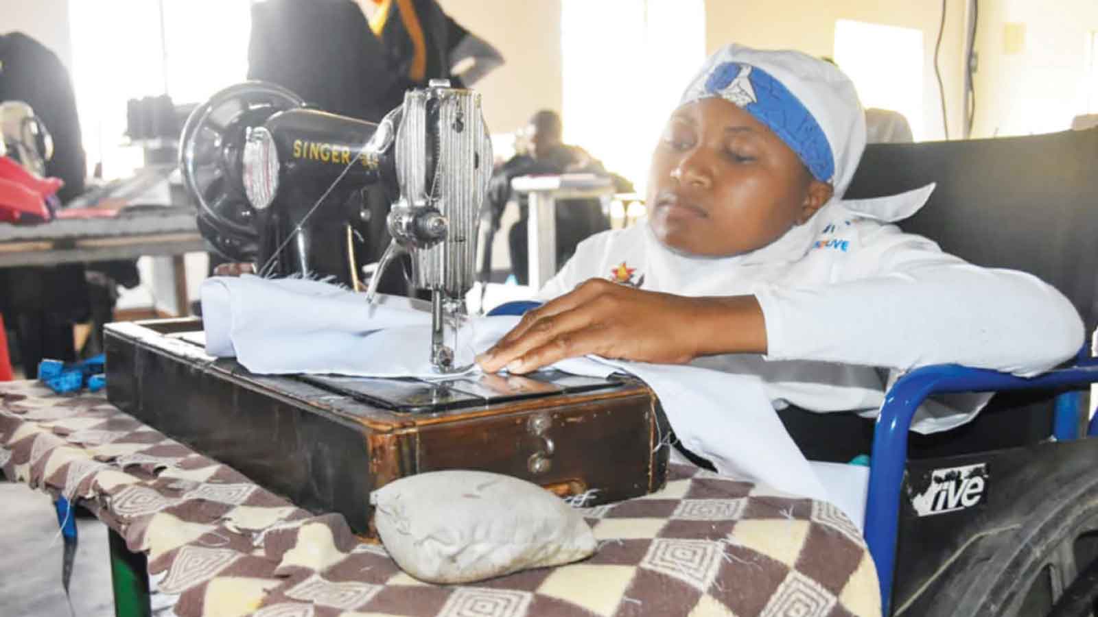 Young designer defies odds, stitches a future