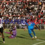 Former Dynamos striker Evans Gwekwerere (right) with player agent George Deda (left) outside Barbourfields on sunday after the Castle Lager Premiership match which ended 1-1