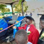 Permanent Secretary in the Ministry of Higher and Tertiary Education, Innovation, Science and Technology Development Professor Fanuel Tagwira (centre) officially commissions a new tractor at Madziwa Teachers College yesterday during the institution's 14th Graduation Ceremony, as College Principal Mr Edward Phiri (right) looks on. Picture: Trust Freddy