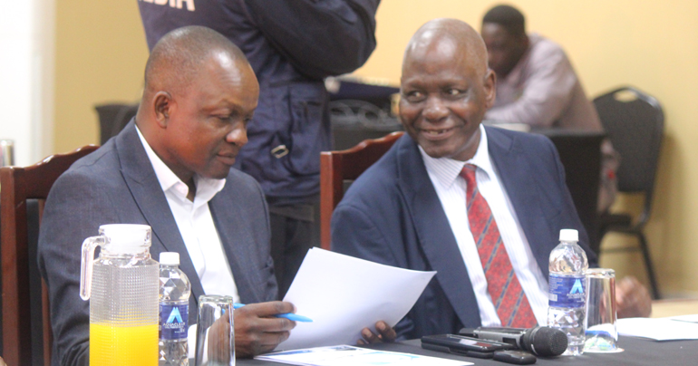 Chief Mutasa (left) exchanges notes with Chief Khumalo