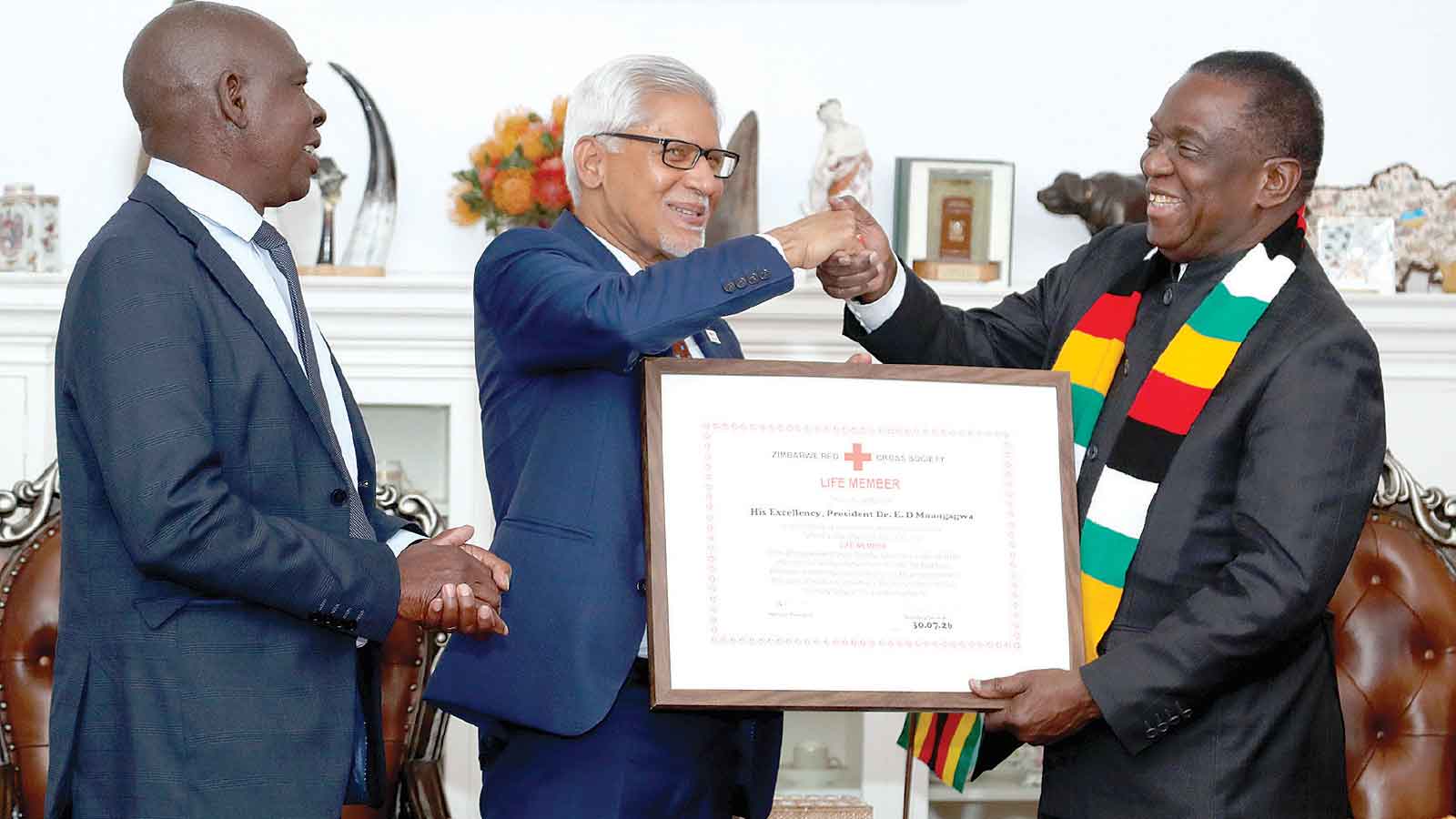 President honoured . . . Recognised as Outstanding Humanitarian by Red Cross