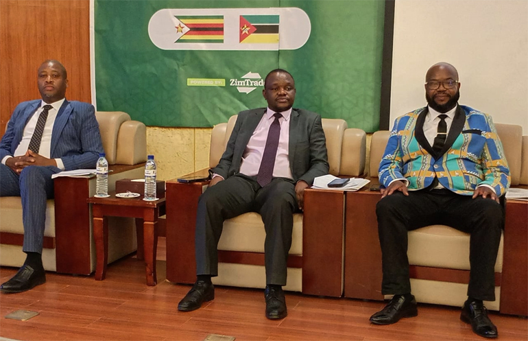 Minister Mugadza (right) follows proceedings during the second ZimTrade Outward Mission in Beira this morning