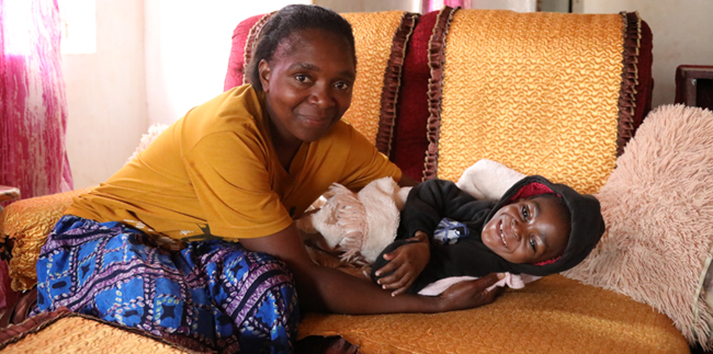 Ms Patience Mutero with her son, Inan Gwarimbo who has spent seven painful years on the sofa