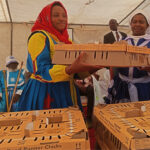Public Service, Labour and Social Welfare Deputy Minister, Mercy Dhina(right) presents chicks donated by First Lady Dr Auxillia Mnangagwa to the Apostolic Ejuwel Jekenisheni Church. The donation was received by the church’s chairlady, Angeline Nyangani, during the church’s Passover Conference held in Mabiya, Zimunya, Manicaland Province last Friday. - Nyasha Chawatama