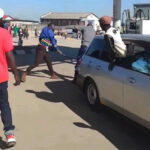 The motorist was caught on camera assaulting a policeman in uniform