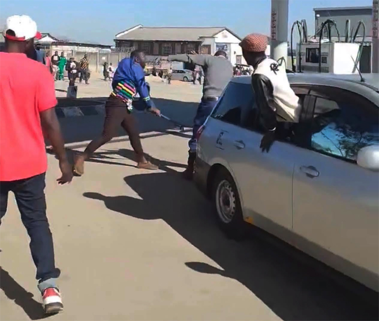 The motorist was caught on camera assaulting a policeman in uniform