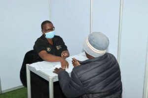 a migrant being processed at the Musina Camp