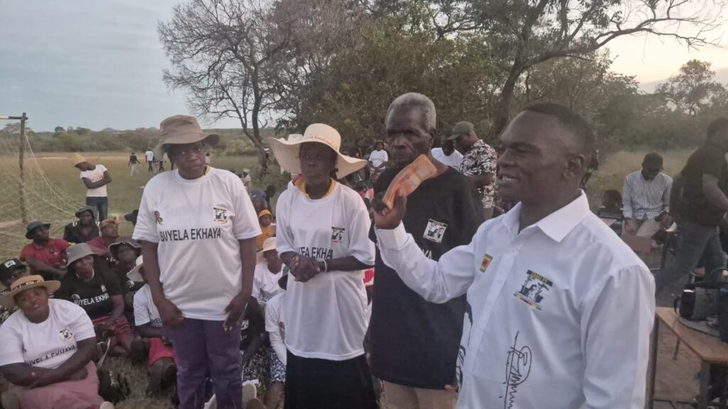 Lungisani Ncube addressing women whom he has equiped with hammer mills and other income generating projects