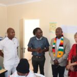 Beitbridge District Medical Officer Dr Lenos Samhere [blue shirt] updating Local Government and Public Works Minister Daniel Garwe [centre] and the UN Resident Coordinator Dr Rosemary Kalapurakal during the tour of a clinic at the Beitbridge Reception and Support Centre-picture by Thupeyo Muleya