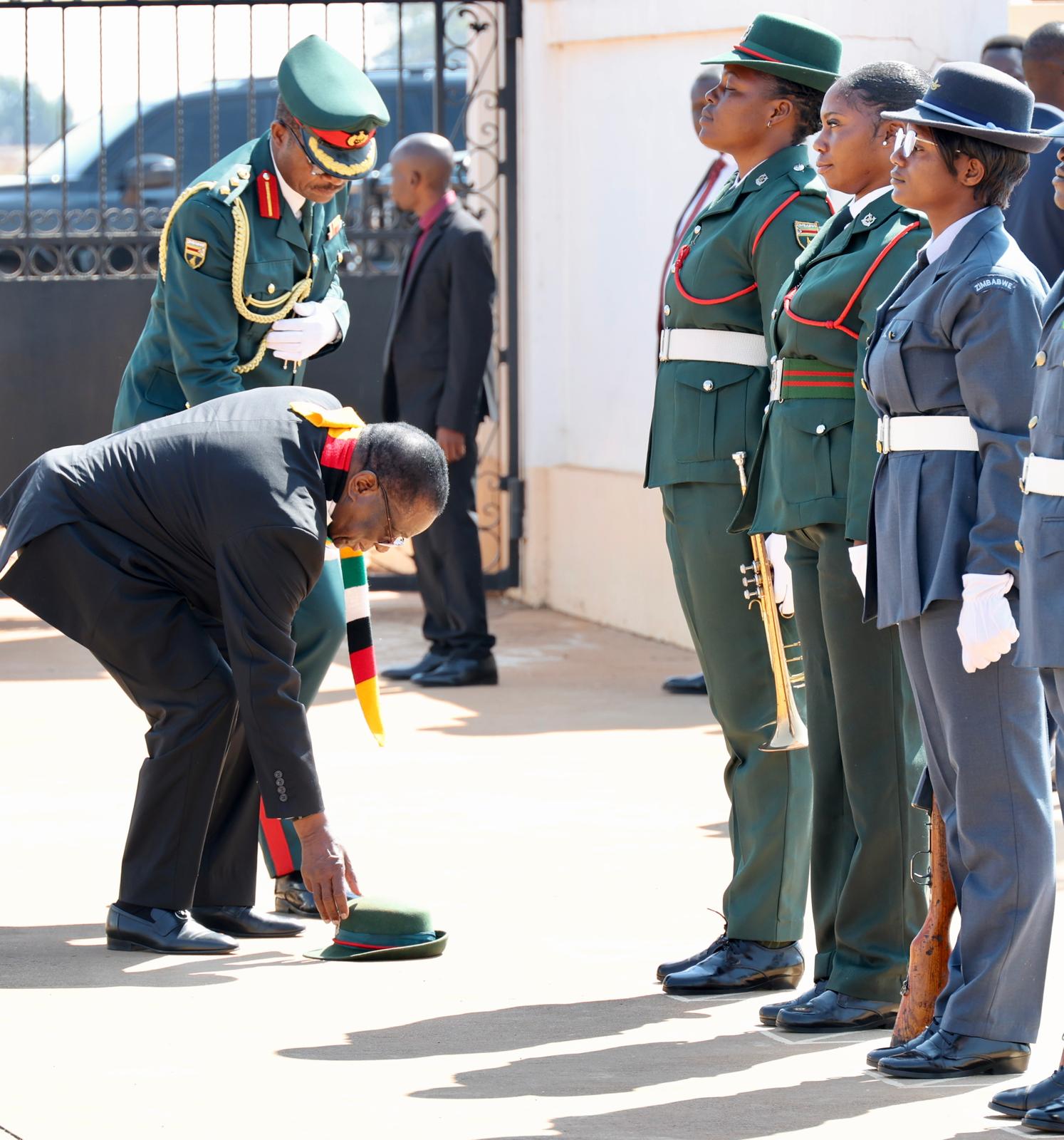 IN PICTURES: President’s simple act steals the spotlight at military ceremony
