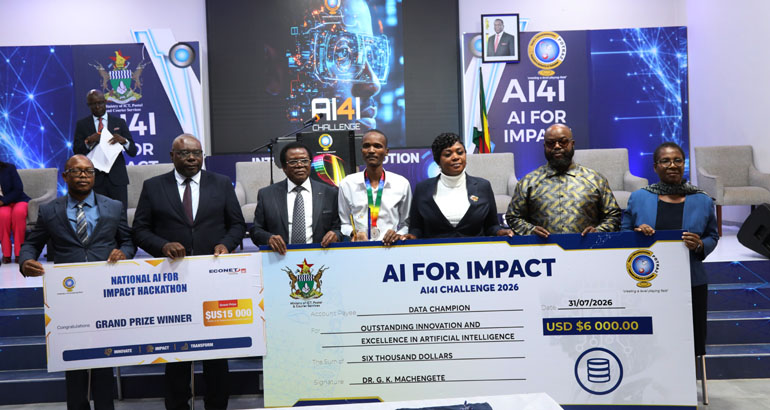 ICT, Postal and Courier Services Minister, Hon. Tatenda Mavetera (third from right), presents a cheque worth US$21 000 and a trophy to Midlands State University Computer Systems Engineering student Nigel Ephraim Basarokwe (center) after he won first place in the Data Track category during the AI for Impact Challenge, organised by POTRAZ, in Nyanga, Manicaland Province, last Friday. Looking on are Permanent Secretary Dr Beaullar Chirume (right), Minister of State for Manicaland Provincial Affairs and Devolution Advocate Misheck Mugadza (second from right), and POTRAZ Director-General Dr Gift Machengete (third from left). – Picture: Nyasha Chawatama