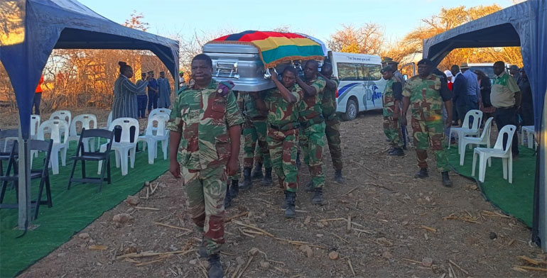 Pallbearers carry the late national hero, Brigadier-General Nyamuronda's body during his final journey to Nyamuronda Village last Sunday