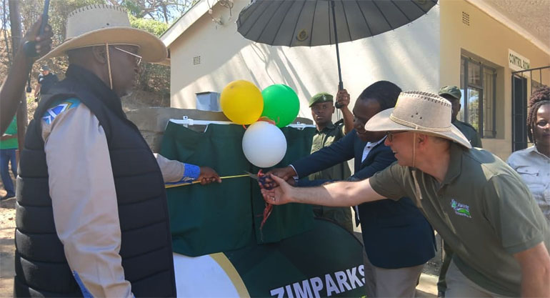 Professor Edson Gandiwa officially commissions some of the projects while Dr Martin Kessler of Aware Trust looks on