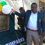 Professor Edson Gandiwa officially commissions some of the projects while Dr Martin Kessler of Aware Trust looks on