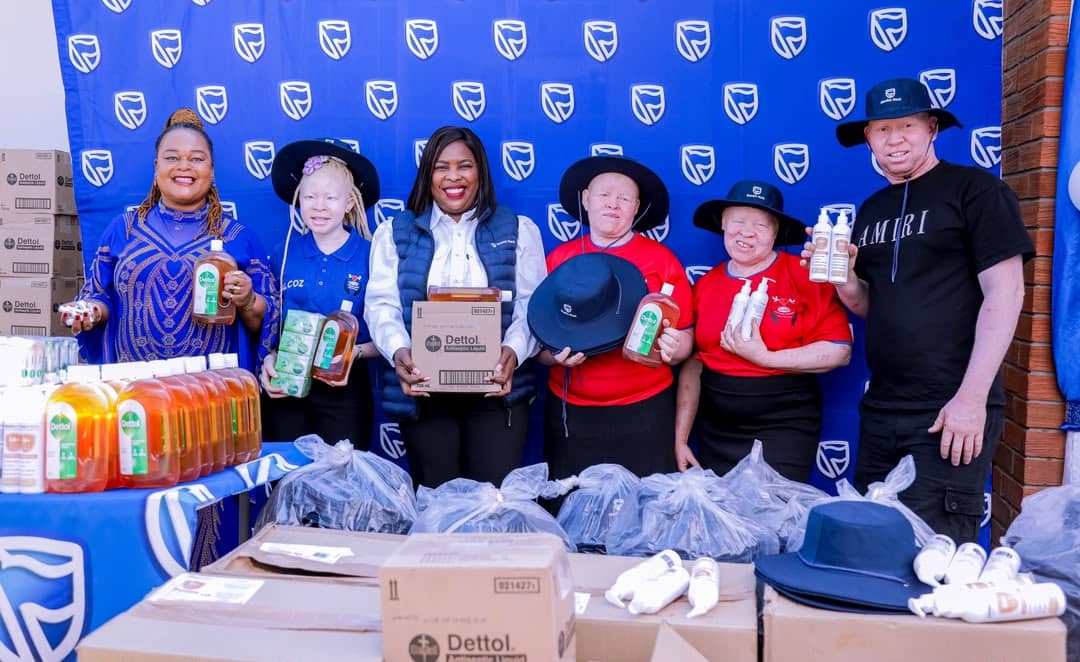 Stanbic Bank donates sun protection products to People Living with Albinism
