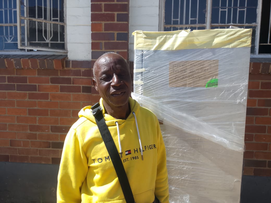 WATCH: Relief for returnee as household goods arrive from South Africa