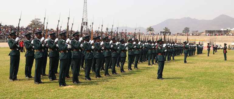 Members of the Zimbabwe National Army take part in the parade during the provincial Defence Forces day celebrations held at Sakubva Stadium on Tuesday