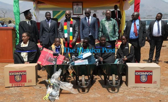 Overall best graduates from the Auto Electrics and Building departments receive their prizes during the Manicaland Vocational Training Centre graduation ceremony at Magamba Vocational Training Centre