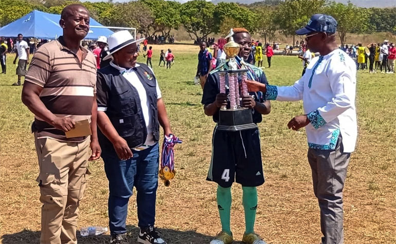 Nyamagaya captain, Bongai Muchazoreka, receives the winner’s trophy from Permanent Secretary for Manicaland Provincial Affairs and Devolution, Abbiot Maronge (right), while Matanuska commercial director, Richard Chiwandire (left) and Ministry of Primary and Secondary Education Mutare District Schools’ Inspector, Tracy Mademutsa look on